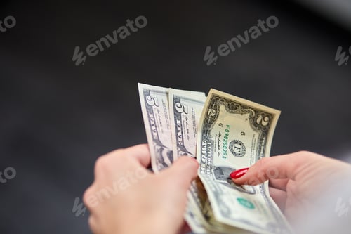 Preview: A Woman Is Holding Money In Her Hands. Economy And Financial Markets Affected By Coronavirus. Save