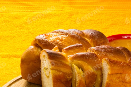 Preview: Peach Strudel With Natural Honey In A Red Bowl On A Bright Yellow Textile Background