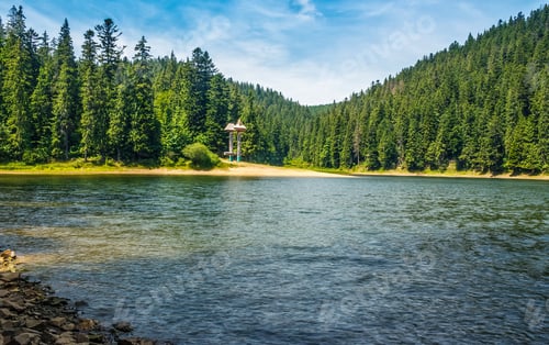 Preview: Mountain Lake Among The Green Fir Forest In Picturesque Summer Landscape. Beautiful Weather With