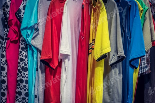 Preview: Colorful Short Sleeve T-Shirts For Sale Hanging On A Stall