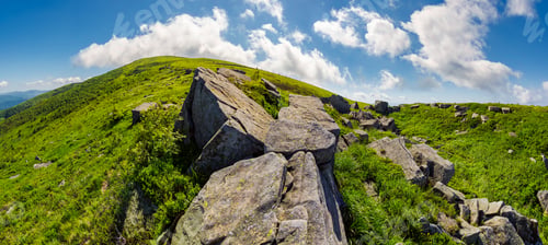 Preview: Panorama Of Gorgeous Mountainous Summer Landscape. Huge Rocky Formations On The Steep Grassy