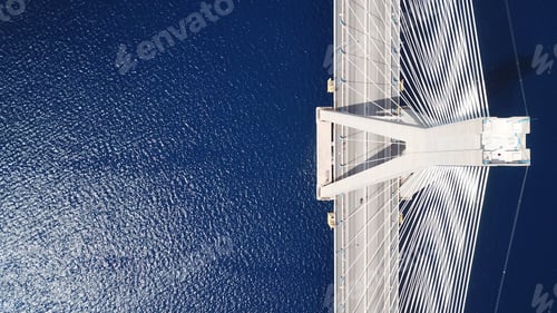 Preview: Aerial Bird'S Eye Drone Photo Of State Of The Art Suspension Bridge Crossing Over Deep Blue Sea