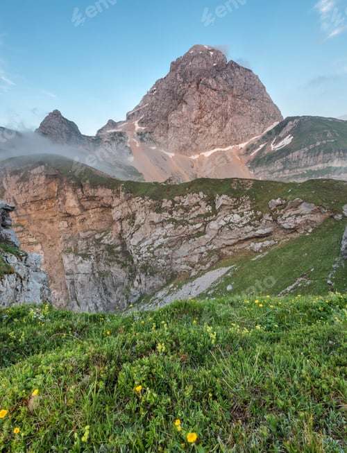 Preview: Foggy Sunset At The Mangart Saddle Mountain In Slovenia.