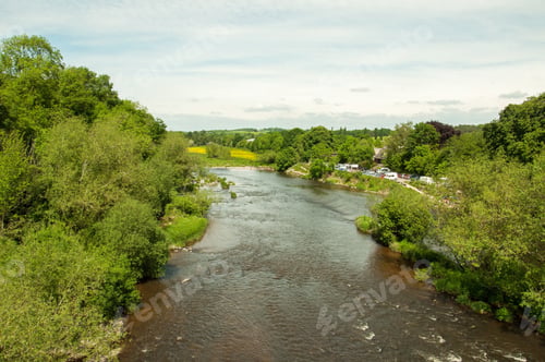 Preview: River Wye Flowing Through The Herefordshire Countryside In Hay On Wye, England.