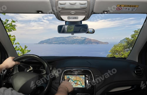 Preview: Driving A Car While Using The Touch Screen Of A Gps Navigation System Towards Sorrento Peninsula