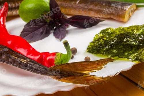 Preview: Smoked Garfish With Lime, Basil, Green Onions, Chili, Nori Chips, Spices, Olive Oil In A White