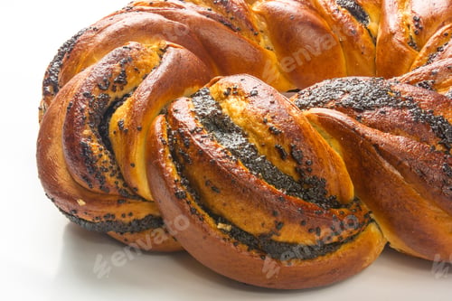 Preview: Braided Poppy Seed Round Loaf On White Background