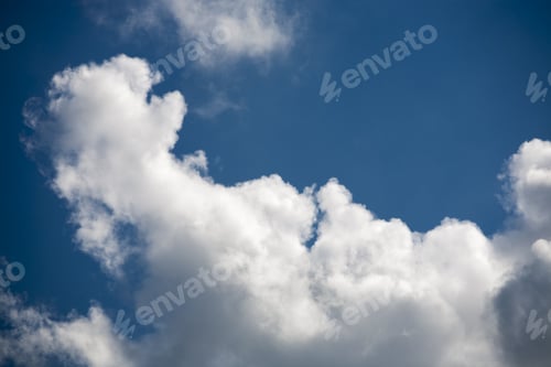 Preview: Beautiful, Fluffy, White And Grey Clouds And Blue Sky