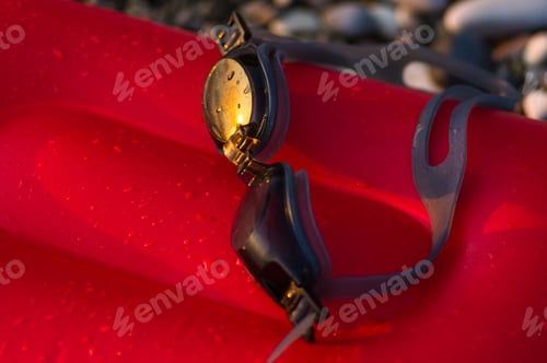 Preview: Eyeglasses For Swimming On A Pebble Beach In The Sea Waves, A Warm Summer Day, Close-Up