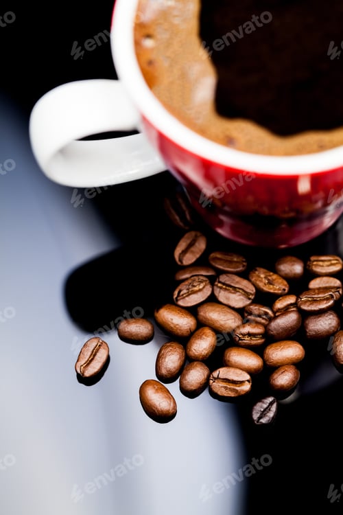 Preview: Red Cup Of Coffee With Coffee Beans And Dark Background
