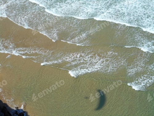 Preview: Paraglider Shadow On Perranporth Beach