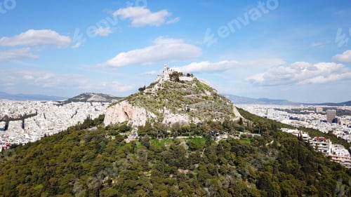 Preview: Aerial Birds Eye View Photo Taken By Drone Of Lycabettus Hill And Iconic Saint George Chapel On Top