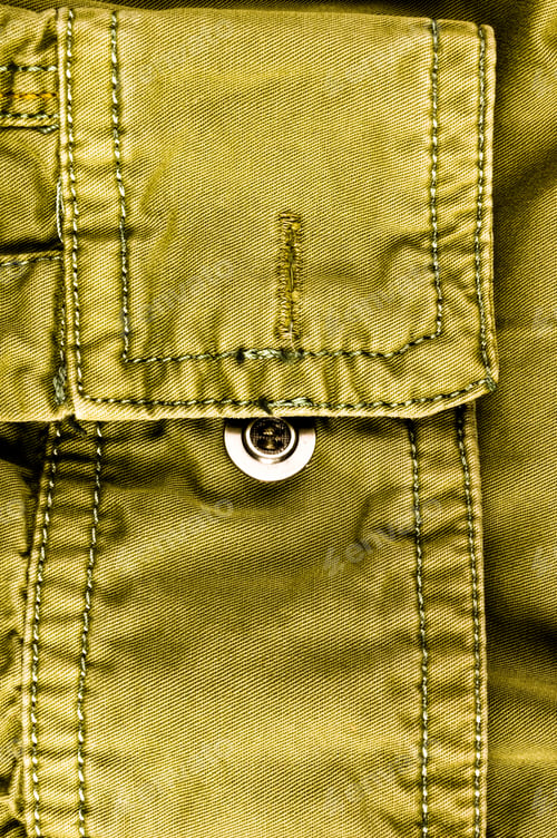 Preview: Clothing Items Stonewashed Cotton Fabric Texture With Seams, Clasps, Buttons And Rivets, Macro