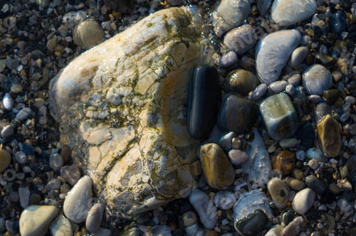 Preview: Pebble Stones On The Sea Beach, The Rolling Waves Of The Sea With Foam