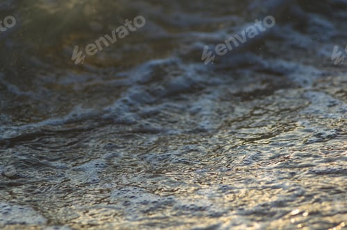 Preview: Pebble Stones On The Sea Beach, The Rolling Waves Of The Sea With Foam