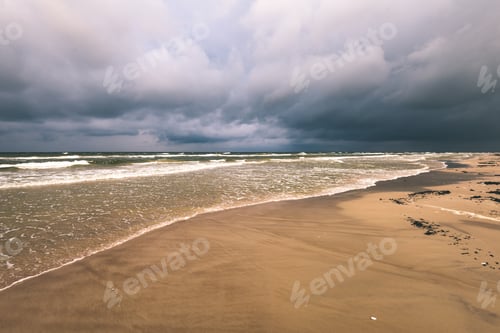 Preview: View Of A Stormy Coast Beach In The Morning. Long Exposure Shot. Latvia, Liepaja. White Waves