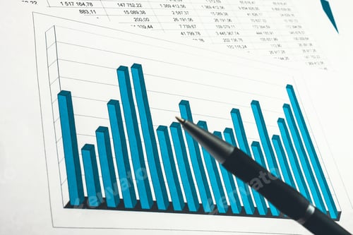 Preview: Businessman Showing A Diagram On A Financial Report Using A Pen