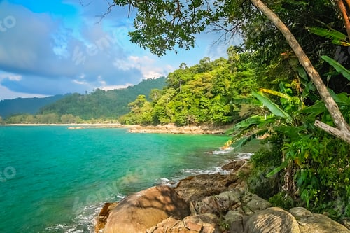 Preview: Torquise Sea Waters And Dense Jungle On The Shores Of A Coast In Thailand Near Krabi