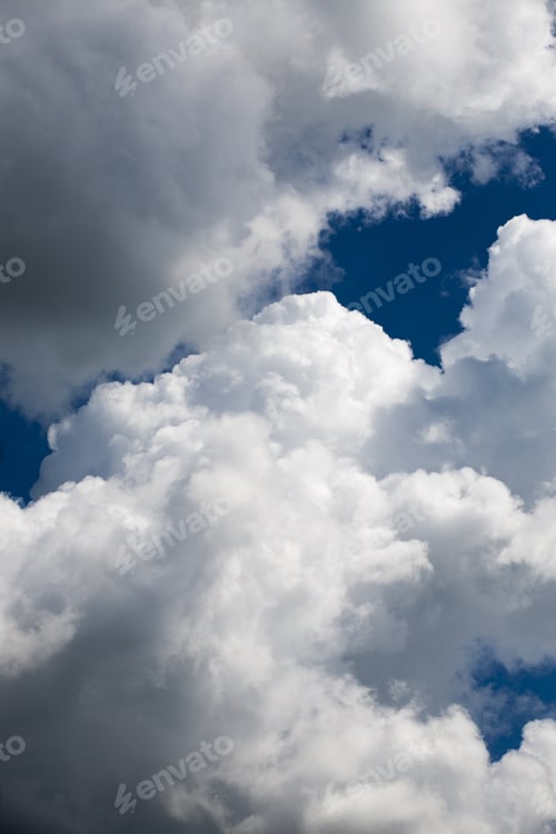 Preview: Beautiful, Fluffy, White And Grey Clouds And Blue Sky