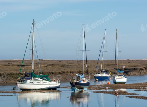 Preview: Small Boats Stranded At Low Tide At Wells Next The Sea, Norfolk, Uk