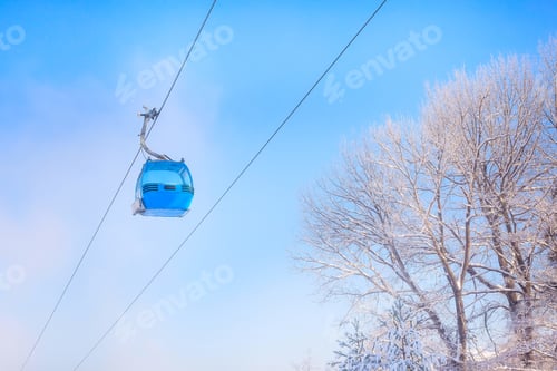 Preview: Bansko, Bulgaria Winter Ski Resort Background With Blue Gondola Lift Cabin And Blue Sky