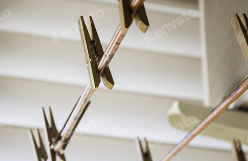 Preview: Wooden Clothes Pegs on a Clothesline