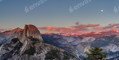 Preview: A Panoramic View Of Half Dome And Yosemite Valley. Golden Light From The Sunset Is Cast Upon The