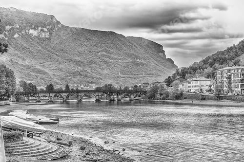 Preview: Scenic View Over The Adda River In The City Of Lecco, Lombardy, Italy