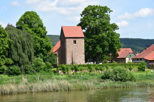 Preview: The Idyllic Village Hemeln At The River Weser With Medieval Church Tower