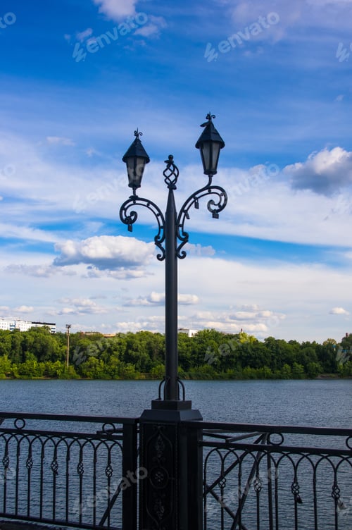 Preview: City Skyline - Classic Lamp Post With Locks Of Lovers At Sunset