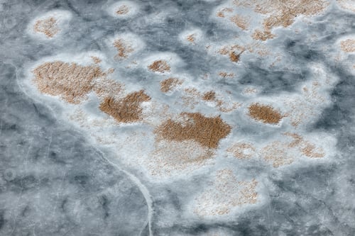 Preview: Aerial View Over The Frozen Surface Of Lake