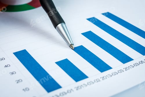 Preview: Businessman Showing A Diagram On A Financial Report Using A Pen