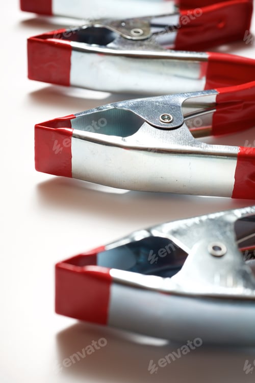 Preview: Clamps On A White Table