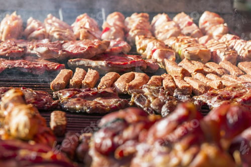 Preview: Different Kind On Grilled Meat And Sausages With Smoke And Steam From The Grill