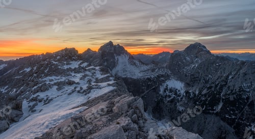 Preview: Sunset In The Mountains With Hikers Resting At The Top