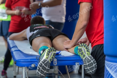 Preview: Athlete Receiving Leg Massage on Treatment Table