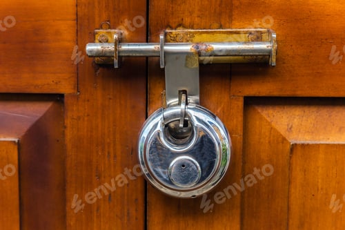 Preview: Old Door Handle On The Brown Doors