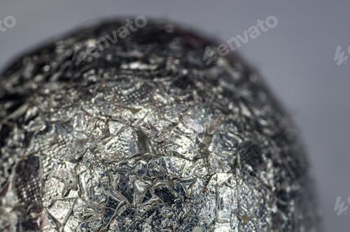 Vista previa: Unusual Abstract Techno View Of Crumpled Aluminum Foil Ball, Close-Up, Macro Photography