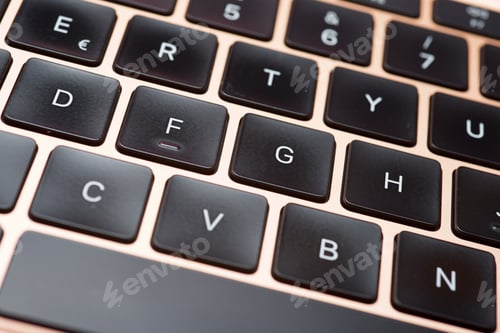 Preview: Forefront Of A Pink Laptop Keyboard.