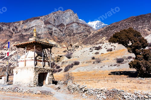 Vista previa: Buddhism Stupa On A Hiking Trail Around Annapurna Massif. Famous Popular Tourist Destination