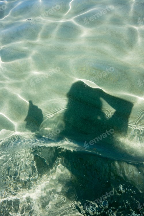 Preview: Underwater Texture With Person Silhouette