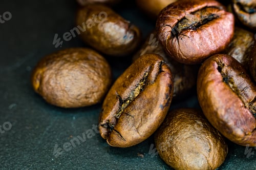 Preview: Brown Roasted Coffee Beans On Black Background, Close Up, Macro
