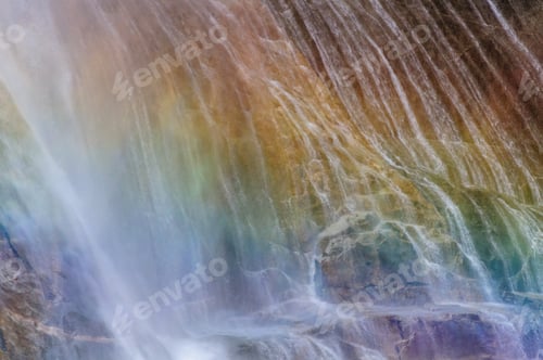 Preview: A Telephoto Shot Of Water Being Deflected By A Rock In The Upper Yosemite Falls, With A Rainbow