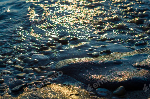 Preview: Pebble Stones On The Sea Beach, The Rolling Waves Of The Sea With Foam