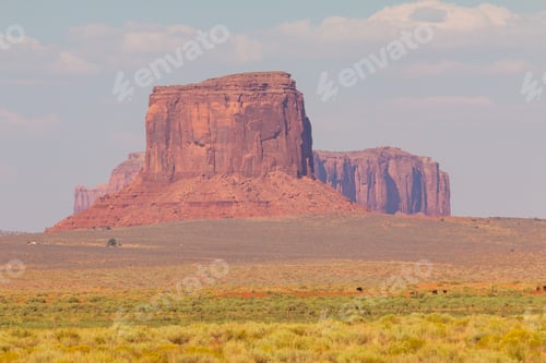 Preview: View On Merrick Butte, East And West Mitten Butte From Road. Navajo Park Of Monument Valley