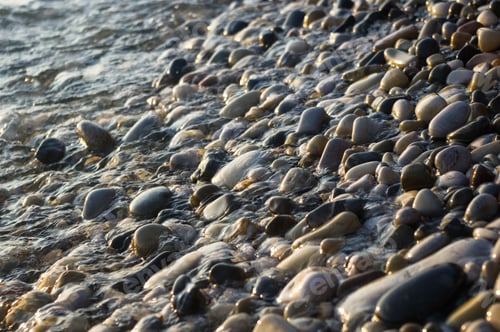 Preview: Pebble Stones On The Sea Beach, The Rolling Waves Of The Sea With Foam