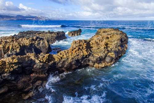 Preview: The Picturesque Rock At The Coast Of The Atlantic Ocean Is Washed By Waves