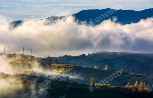 Preview: Fog Rising Over The Rural Hills In Morning Light. Dramatic Carpathian Countryside Autumnal Scenery