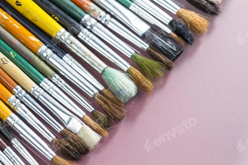 Preview: Set Of Different Paintbrushes With Pink Background