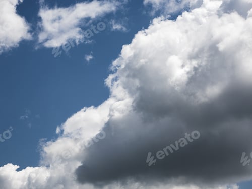 Preview: Beautiful, Fluffy, White And Grey Clouds And Blue Sky